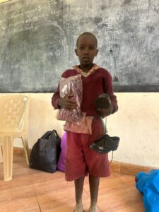 Child supported by Give Them Light